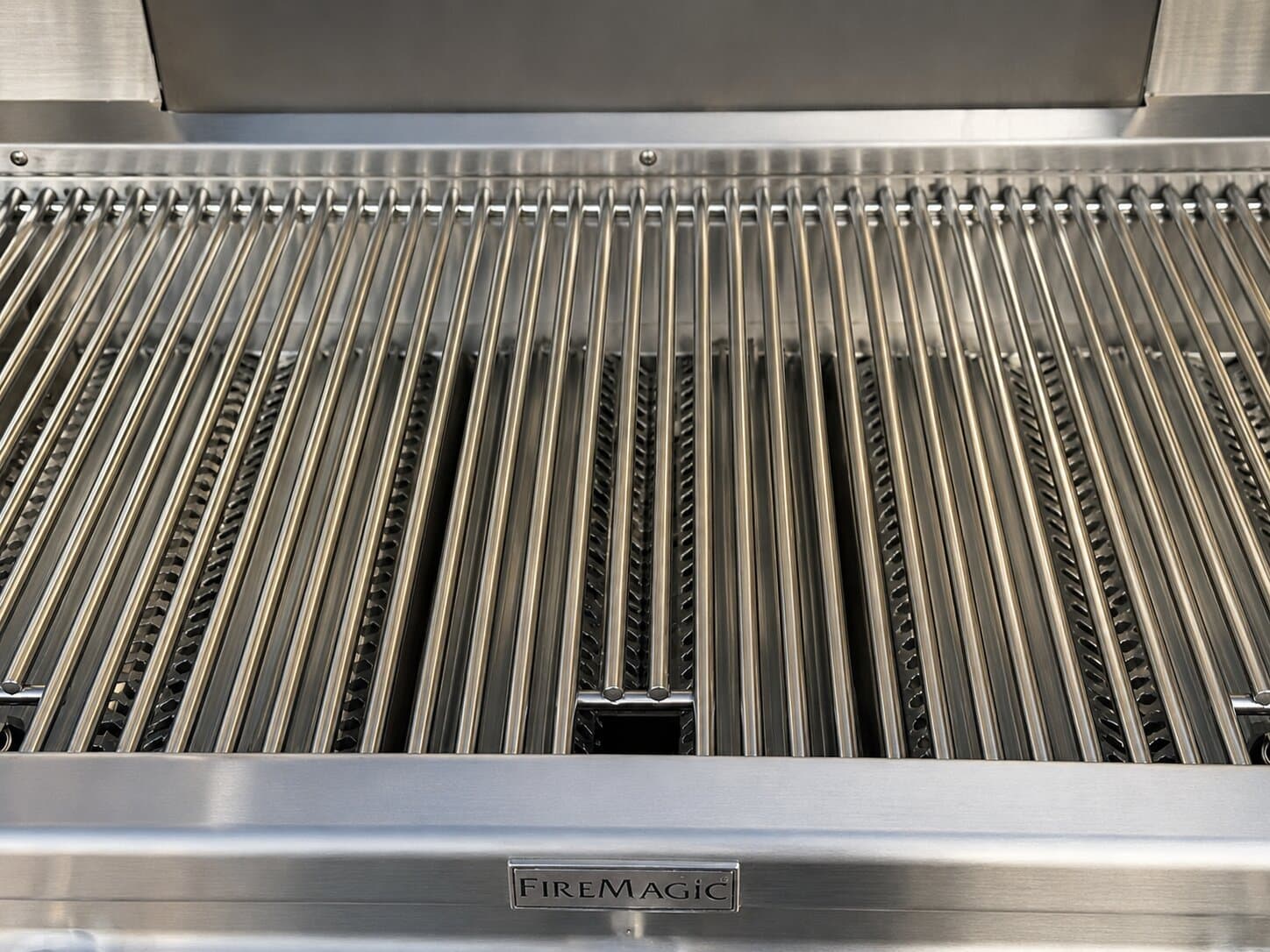 Same Fire Magic grill after restoration — clean grates and polished stainless